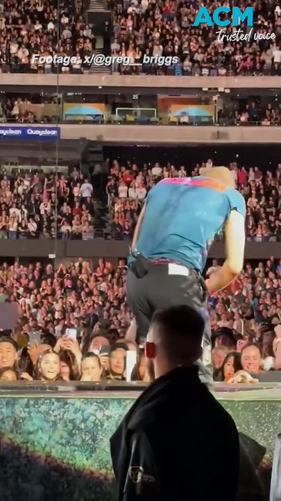 Coldplay singer Chris Martin falls through stage in Australia