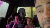 Little boy bursts into tears at the car wash while his sister stays calm
