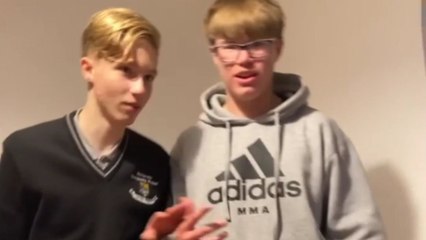 Boy's attempt to kick boxing bag goes wrong as he slips and falls