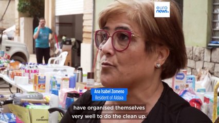 Feeling abandoned after historic floods, Valencians press on with cleanup effort