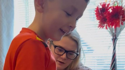 Funny boy fully believes his mom won the lottery after being surprised with PS5