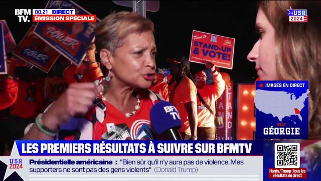 Élection américaine: On organise un espace de festivités pour encourager les gens à aller voter , à Atlanta, des militants avec musique et pancartes devant les bureaux de vote