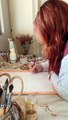 Artist is painting a butterfly in natural earth pigment watercolors!