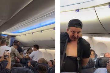 Unruly Passenger Attempts to Open Plane Door, Rescued by Fellow Flyers ✈️