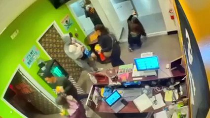 CCTV shows teen employee shelter shoppers during shooting