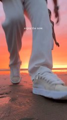 Enjoying a beautiful beach sunset together.