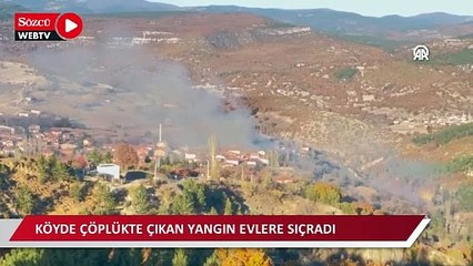 Köyde çöplükte çıkan yangın evlere sıçradı