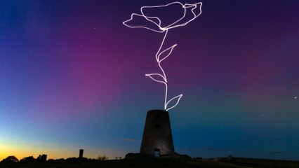 Artist creates 300ft poppy set against the Northern Lights for Remembrance Day