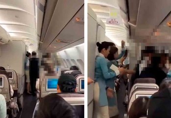 緊迫の瞬間：乗客が飛行中に飛行機のドアを開けようとする瞬間を映したビデオが話題に
