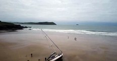 Film by Polzeath Walks of Watchet yacht Penn-Ultimate at first light after it ran aground during the night.