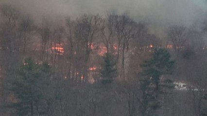 Thick smoke and flames haunt Greenwood Lake residents as forest fire remains uncontained