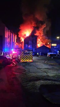 Firefighters tackling a huge fire at the former Dog Inn on Church Street, Preston