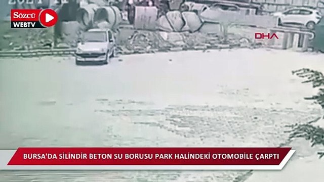 Bursa'da silindir beton su borusu park halindeki otomobile çarptı; o anlar kamerada