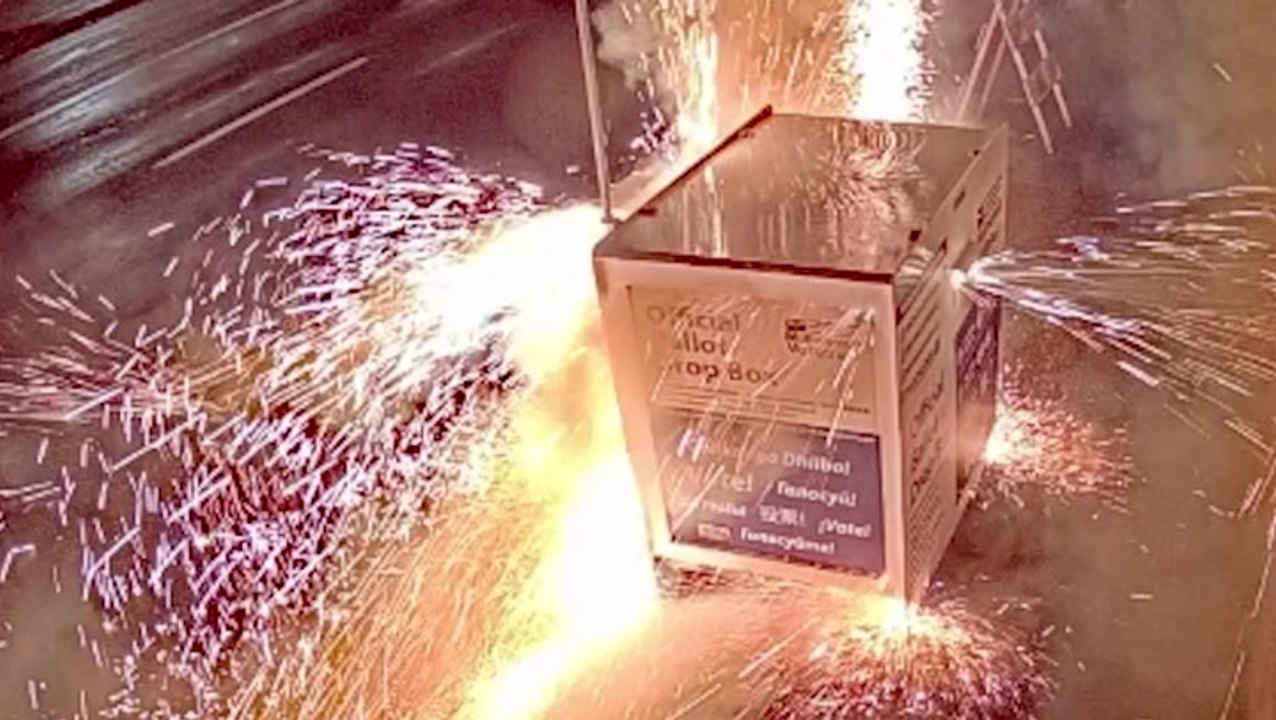 Watch: Driver drops device into US ballot box seconds before explosion