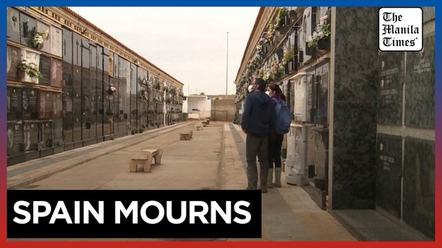 Grieving Spanish families struggle to bury relatives after Valencia floods