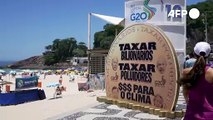 Protesto às margens do G20: 'Taxar Bilionários, Taxar Poluidores, $$$ para o Clima'