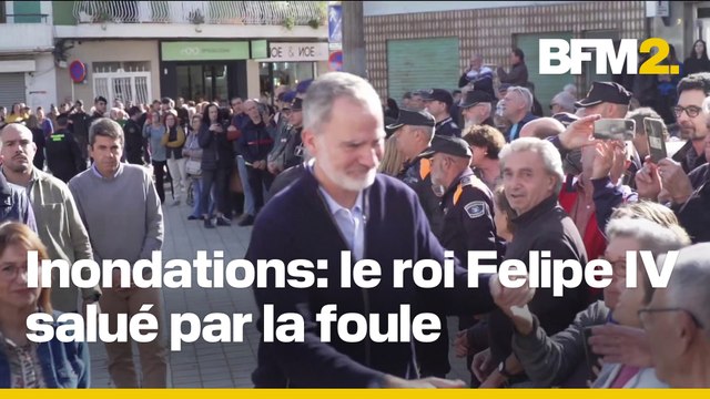 De retour dans les zones dévastées par les inondations, le roi et la reine d'Espagne acclamés