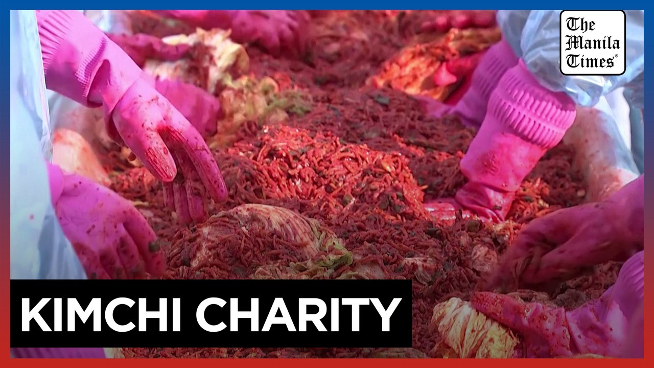US troops in South Korea swap guns for love in kimchi-making charity event