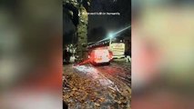 Watch as Notts locals jump into action as National Express coach on ice slides dangerously down busy road