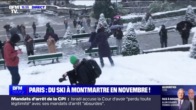 Neige à Paris: des parisiens descendent la butte Montmartre à skis