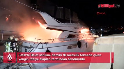 Fatih'te, sahile demirli teknede yangın