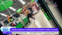 Ladrones ingresan a supermercado con marros y roban celulares