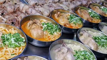 Chicken Seafood Noodles with Whole Chicken on Top