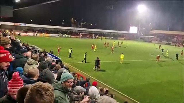 Crawley Town players and fans celebrate win over Rotherham United