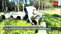 Pobladores reconstruyen puentes tras el paso de 'Nadine' en Veracruz
