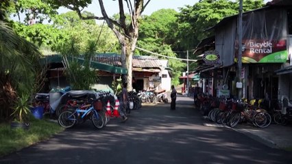 In Singapore, a rustic island haven faces an uncertain future
