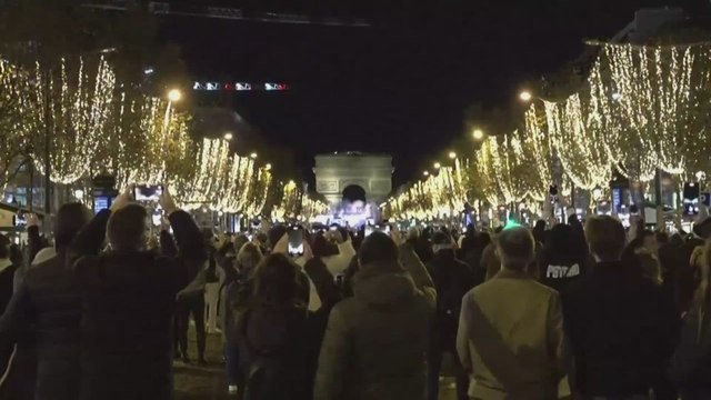 Paris' Champs Elysees glitters with Christmas lights as holiday season nears