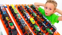 Vlad and Nikita play with toy monster trucks - Hot Wheels cars for kids