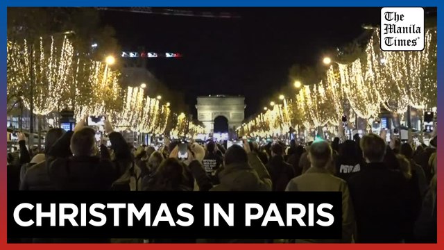 Paris' Champs Elysees glitters with Christmas lights as holiday season nears