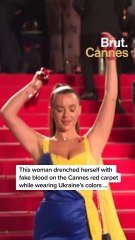 Woman covers herself in red dye at Cannes