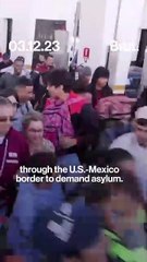 Hundreds of migrants rush U.S.-Mexico border
