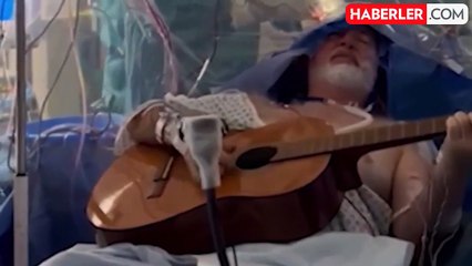 Beyninden tümör alınan hasta, ameliyat masasında gitar çaldı