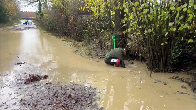 Flooding in West Sussex: Resident helps to clear water