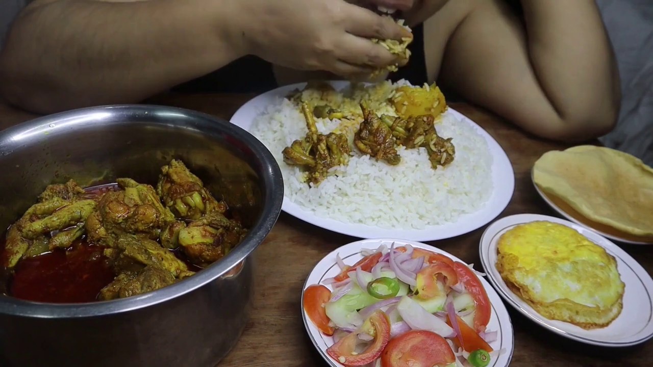 EATING POUCHED EGGS, CHICKEN CURRY, SALAD, WHITE RICE, PAPPAD FRY