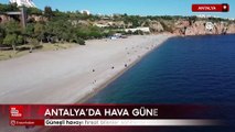 Antalya'da güneşli havayı fırsat bilenler sahillerde vakit geçirdi