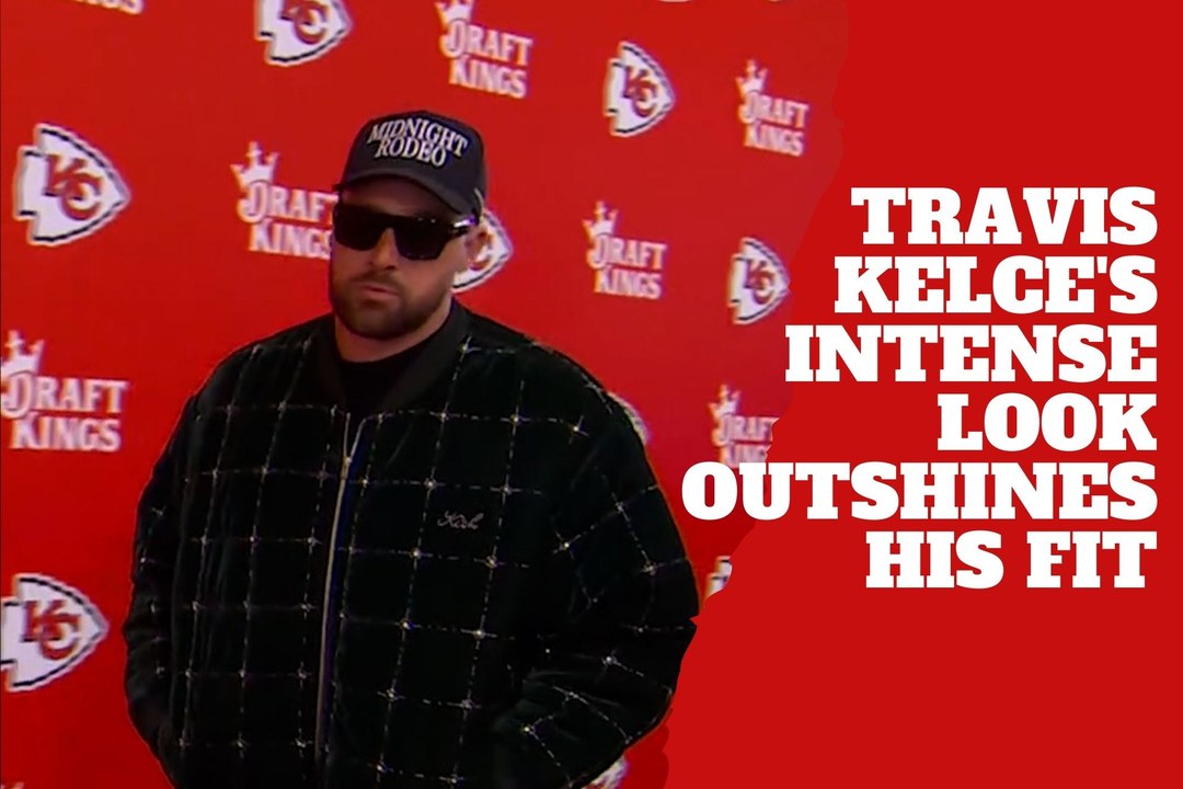 Travis Kelce's intense expression steals the spotlight, outshining his epic outfit