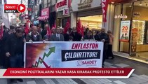 Saadet Partisi Ortahisar ilçe örgütünden AK Parti iktidarının ekonomi politikalarını yazar kasa kırarak protesto etti