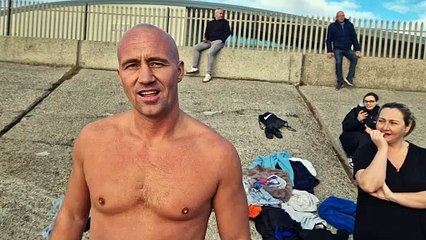 Stewart Perrett and supporters take dip in chilly Blackpool sea