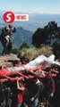 Guatemalan devotees return Christ statue to volcano crater