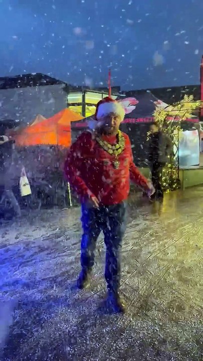 Mayor Drew Creek enjoying the snow machine at Newquay Christmas lights switch on 2024