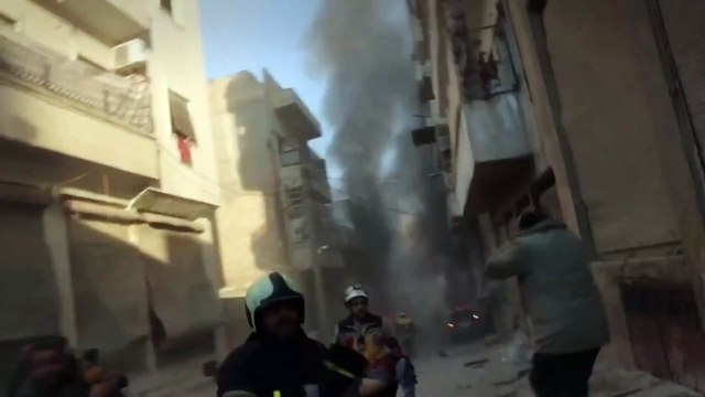 Syrian Civil Defence teams rescue survivors as group says strikes hit Idlib City