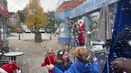 Santa brings a snow storm to Haslemere's high street