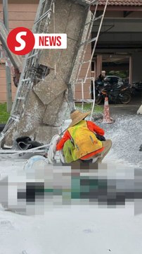 Two die in worksite mishap after crane topples