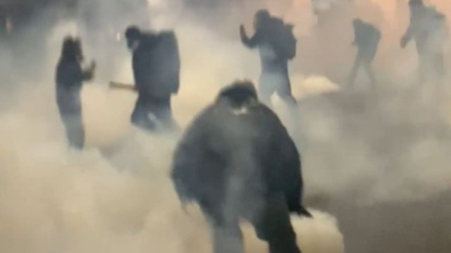 Tbilisi, Georgia: Protesters use fireworks and lasers while clashing with riot police