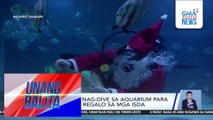 Santa Claus, nag-dive sa aquarium para magbigay ng regalo sa mga isda | Unang Balita