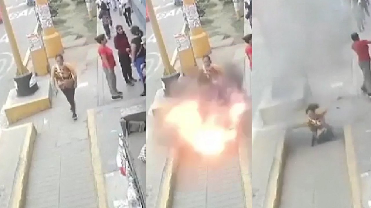 Momento en que explota una arqueta y una mujer cae dentro en Lima (Perú)